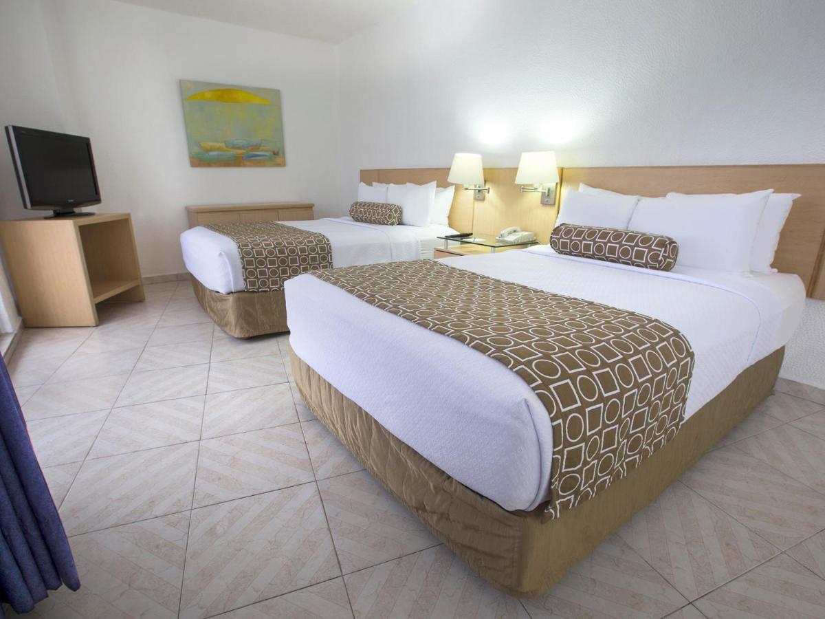 فندق إتش إس هوتسون سمارت أكابولكو المظهر الخارجي الصورة A typical room at the hotel